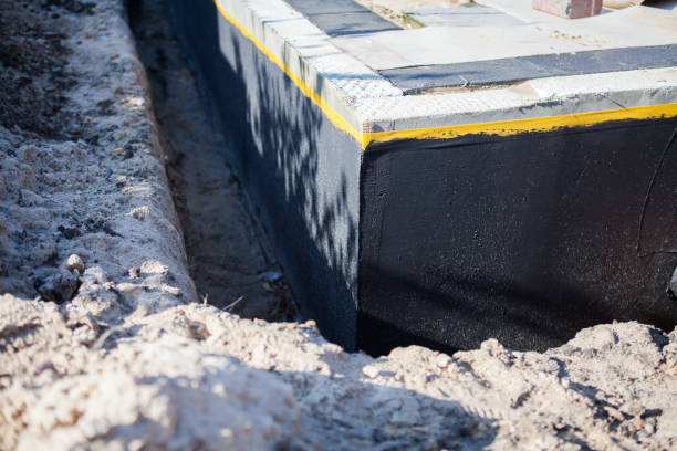 Professional Waterproofing technician working in Galloway, OH